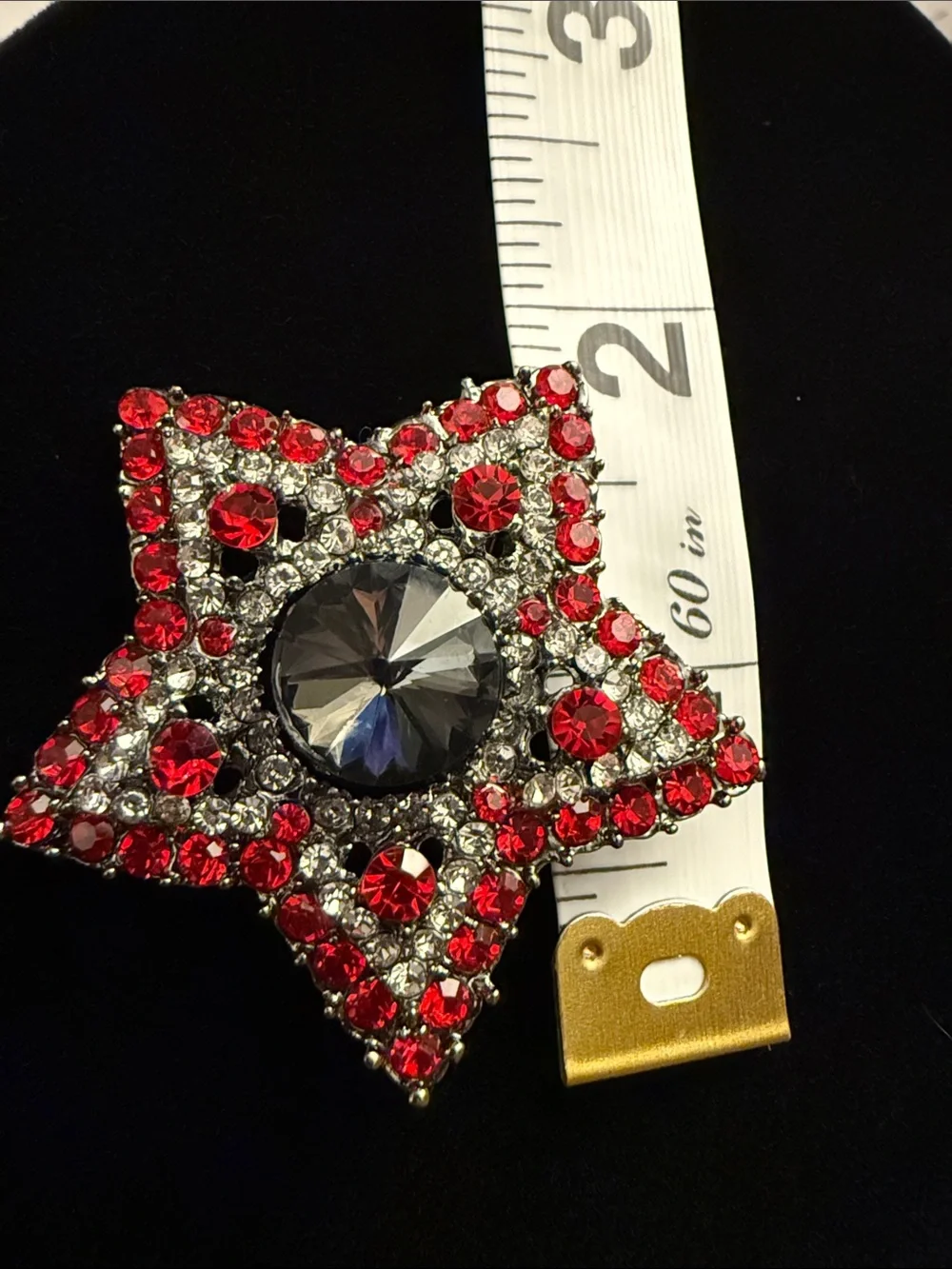 Sparkling Red Starburst Brooch with Center Gem